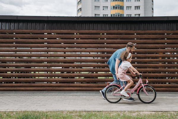 Child riding a correctly sized bicycle