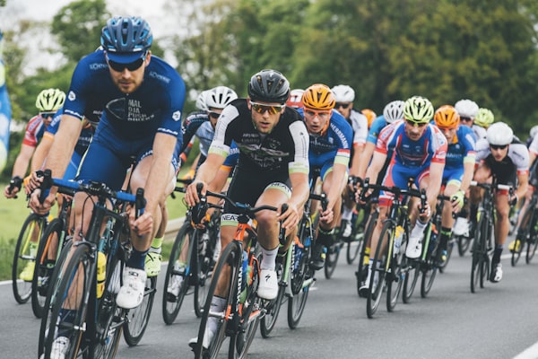 Road cyclist riding in an aerodynamic position