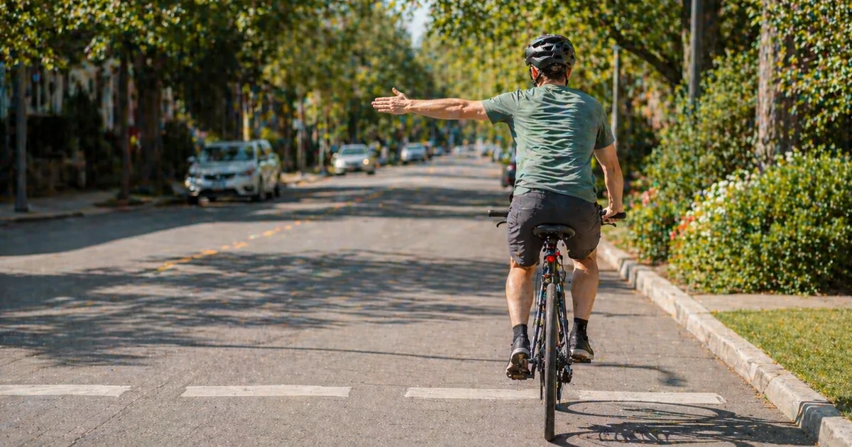 Bicycle Hand Signals: Legal Requirements by US State (2026) - BikeSize bike laws guide